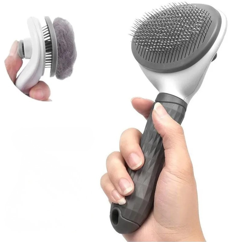 Brosse démêlante, autonettoyante pour chiens et chats.