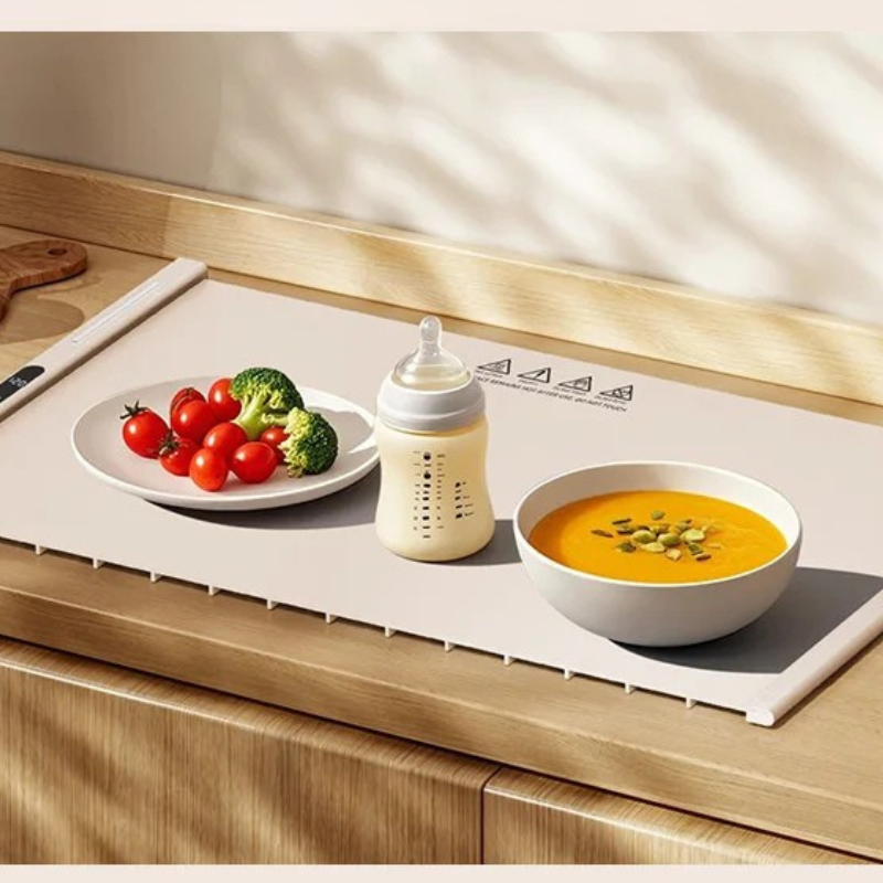 Plateau Chauffant électrique pliable en silicone. Gardez vos plats chauds.