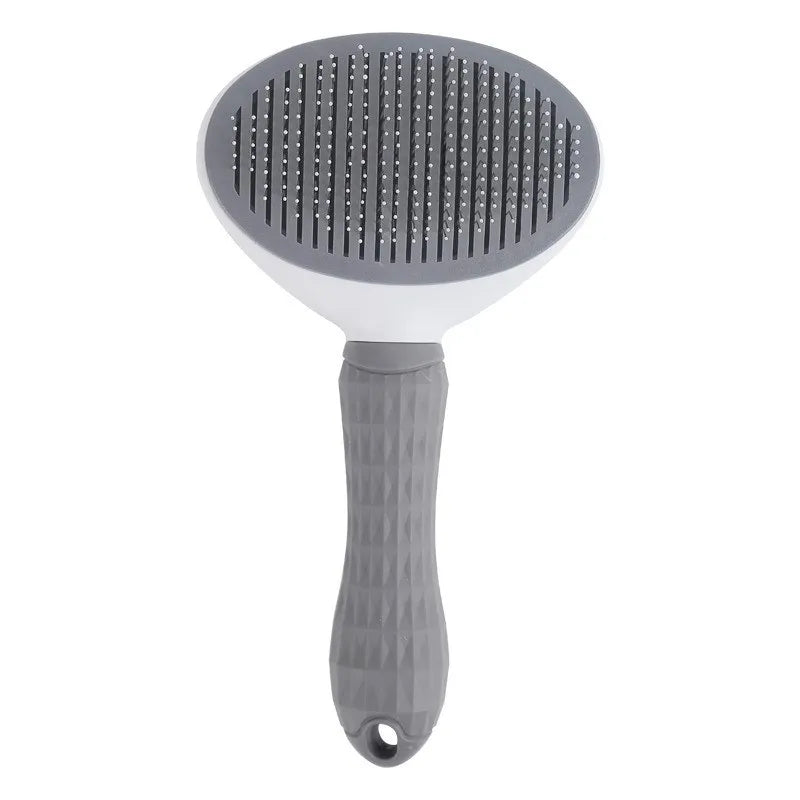 Brosse démêlante, autonettoyante pour chiens et chats.