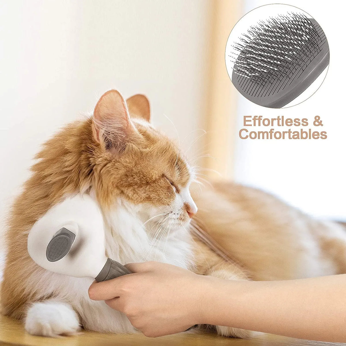 Brosse démêlante, autonettoyante pour chiens et chats.