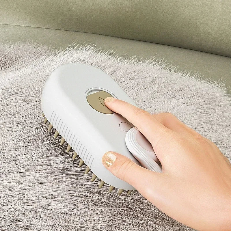 Brosse de toilettage à vapeur pour chiens et chats. Humidificateur intégré. Fenêtre transparente affiche le niveau d'eau. Conception ergonomique de la poignée. Livrée avec un cable USB.
